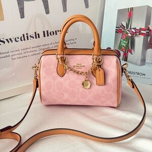 Coach Mini Rowan Bag In Signature With Charms in Powder Pink CEK79